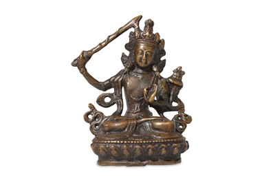 Lot 130 - A small Tibetan bronze figure of Manjusri,...