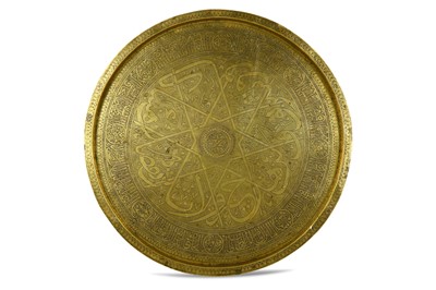 Lot 176 - A LARGE ENGRAVED MAMLUK-REVIVAL BRASS TRAY...