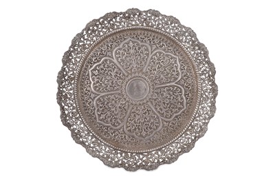 Lot 288 - A CIRCULAR SILVER TRAY Possibly Kutch, India,...