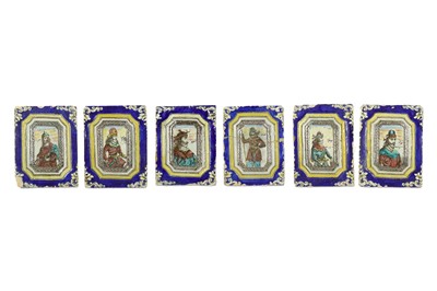 Lot 165 - A SET OF SIX MOULDED FIGURAL POTTERY TILES...