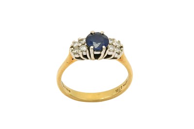 Lot 503 - A sapphire and diamond ring The circular-cut...