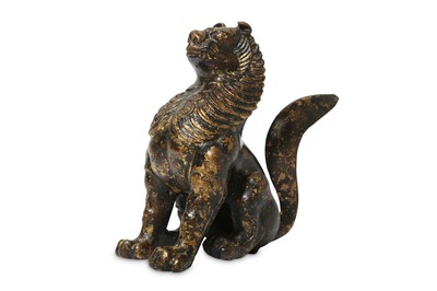 Lot 674 - A CHINESE GILT-BRONZE FIGURE OF A SEATED...