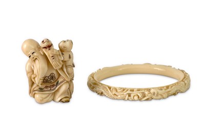 Lot 117 - An early 20th Century Japanese carved ivory...