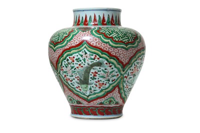 Lot 217 - A CHINESE WUCAI 'FISH' JAR. Transitional...