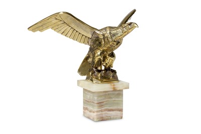 Lot 169 - A brass model of an eagle  with its wings...