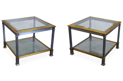 Lot 258 - A pair of brushed steel and parcel gilt side...