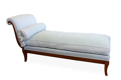 Lot 260 - A cherry wood chaise lounge, upholstered in...