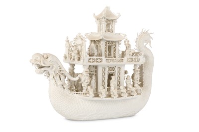 Lot 213 - A CHINESE WHITE BISCUIT MODEL OF A DRAGON BOAT....