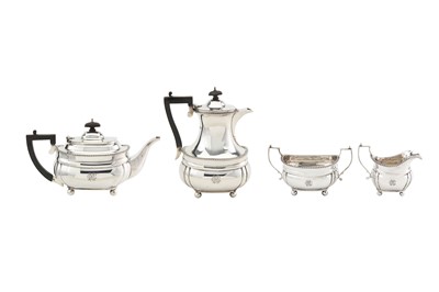 Lot 241 - A George V sterling silver four-piece tea...