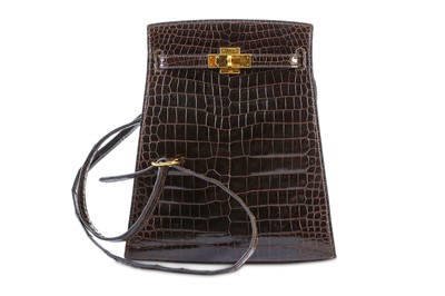 Lot 85 - Hermès Marron Crocodile Porosus Kelly Sport 20,...