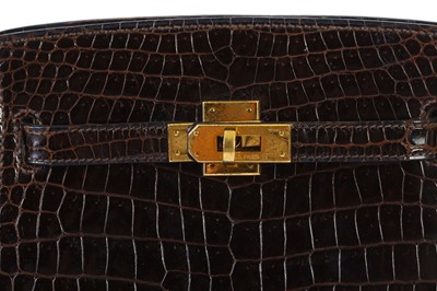 Lot 85 - Hermès Marron Crocodile Porosus Kelly Sport 20,...