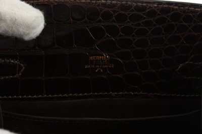 Lot 85 - Hermès Marron Crocodile Porosus Kelly Sport 20,...