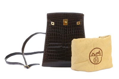 Lot 85 - Hermès Marron Crocodile Porosus Kelly Sport 20,...
