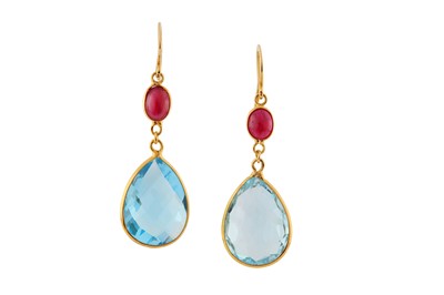 Lot 125 - A pair of blue topaz and ruby earrings Each...