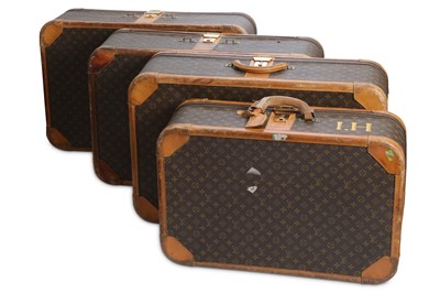 Lot 312 - Four Louis Vuitton Monogram Stratos Suitcases,...