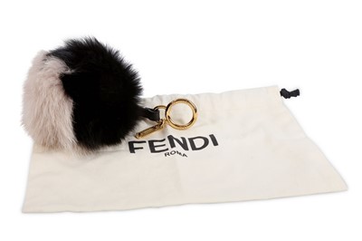 Lot 316 - Fendi Fur Pom Pom Bag Charm, cream and black...