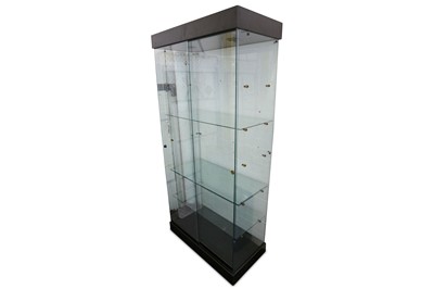 Lot 229 - A glass display cabinet with two sliding doors,...