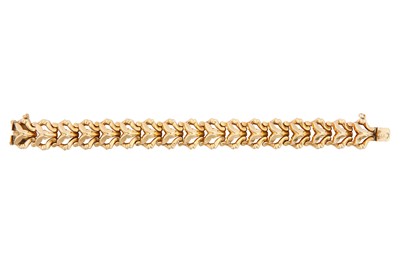 Lot 72 - A fancy-link bracelet  Designed as an...