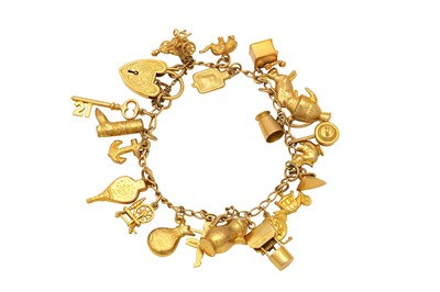 Lot 525 - A charm bracelet With a 9ct gold padlock clasp,...