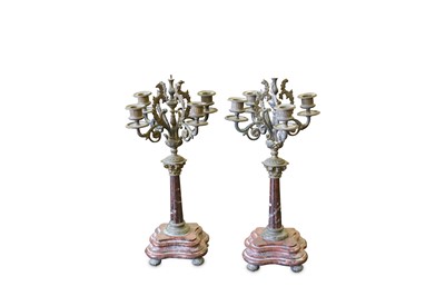 Lot 215 - A pair of late 19th Century French candelabra,...