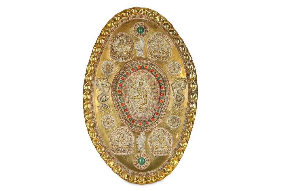 Lot 149 - AN OVAL TIBETAN BRASS PLATE WITH VAJRAYOGINI....