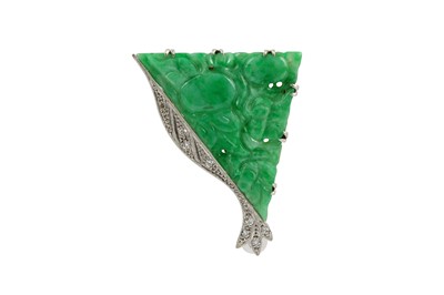 Lot 9 - A diamond and jadeite clip The triangular-cut...