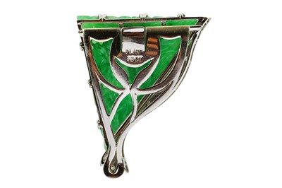 Lot 9 - A diamond and jadeite clip The triangular-cut...