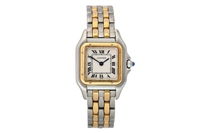 Lot 20 - CARTIER. A LADIES STAINLESS STEEL AND GOLD...