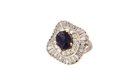 Lot 213 - An iolite and diamond ballerina ring The...