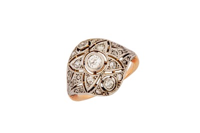 Lot 65 - A diamond dress ring Of openwork bombé design,...