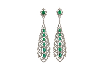 Lot 194 - A pair of emerald and diamond pendent earrings...