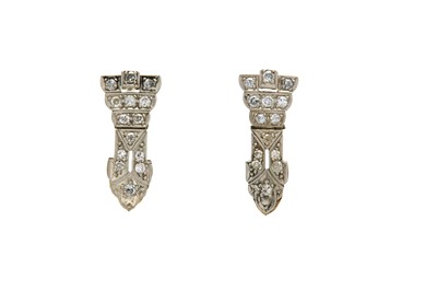 Lot 511 - A pair of diamond earrings Of geometric form,...