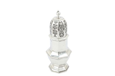 Lot 673 - A George V sterling silver sugar caster,...