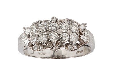 Lot 192 - A diamond dress ring The central row of...