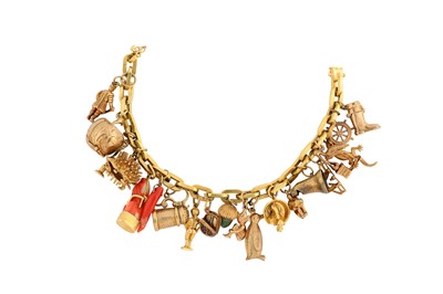 Lot 149 - A charm bracelet The filed cable-link chain,...