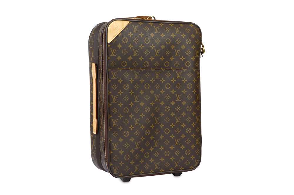 Sold at Auction: A Louis Vuitton Monogram Pegase Suitcase.