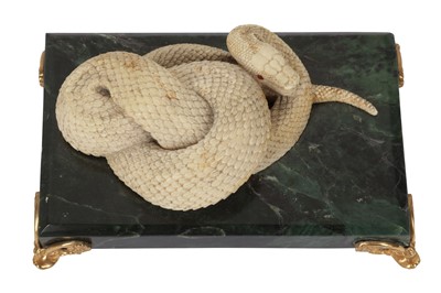 Lot 81 - A LATE 19TH / EARLY 20TH CENTURY CARVED IVORY SNAKE