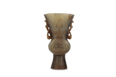 Lot 893 - A CHINESE GREY-GREEN JADE 'DRAGON' VASE, GU....