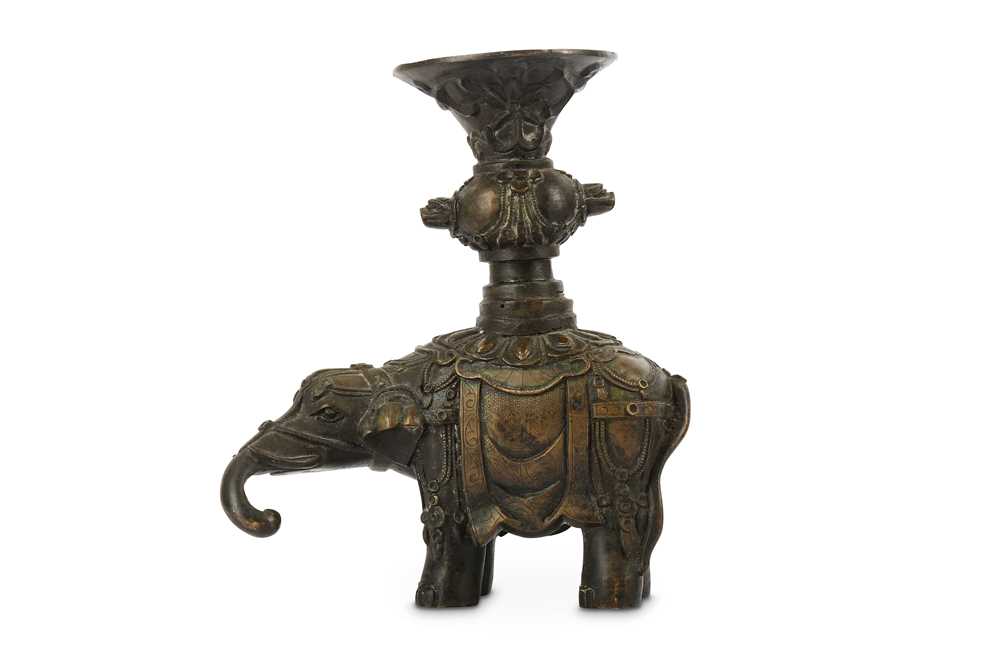 Lot 105 - A CHINESE BRONZE MODEL OF AN ELEPHANT WITH A