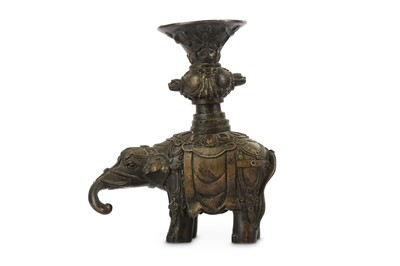Lot 105 - A CHINESE BRONZE MODEL OF AN ELEPHANT WITH A...