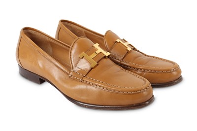 Lot 377 - Hermes Tan Leather Loafers, gilt metal H...