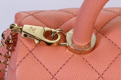 Lot 10 - Chanel Coral Pink Coco Handle Bag, c. 2019,...