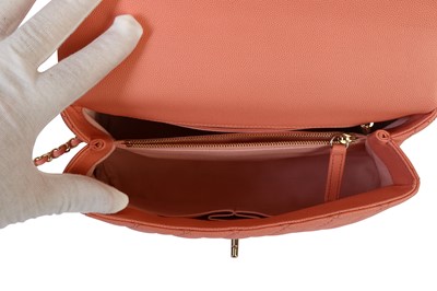 Lot 10 - Chanel Coral Pink Coco Handle Bag, c. 2019,...