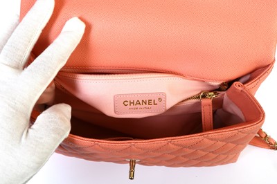 Lot 10 - Chanel Coral Pink Coco Handle Bag, c. 2019,...