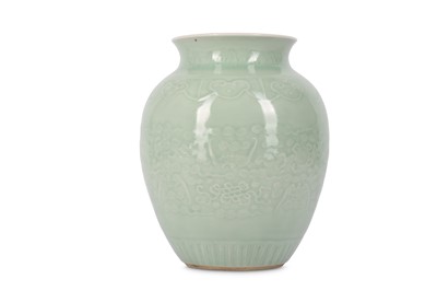 Lot 779 - A CHINESE CELADON-GLAZED 'BATS AND BUDDHIST...