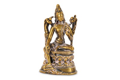 Lot 961 - A SMALL POLISHED BRONZE FIGURE OF TARA. Tibet,...