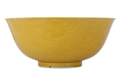 Lot 39 - A CHINESE MUSTARD-GLAZED ANHUA 'DRAGON' BOWL....