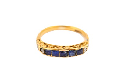 Lot 507 - A sapphire and diamond ring The central row of...