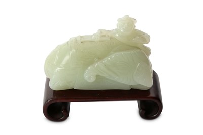 Lot 231 - A CHINESE PALE CELADON JADE CARVING OF AN...