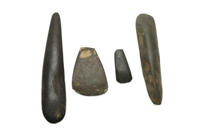 Lot 838 - FOUR HIGHLANDS STONE AXE HEADS, PAPUA NEW...